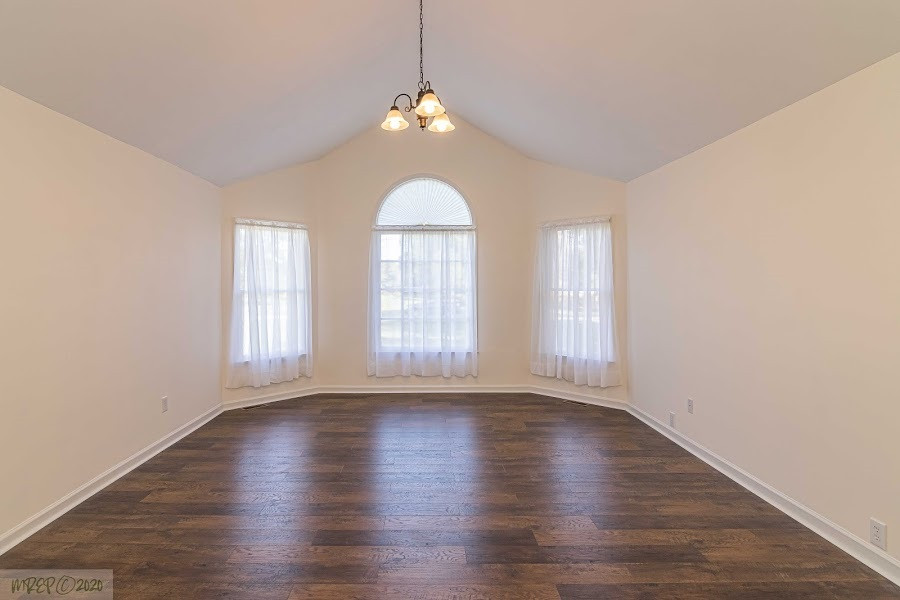 5960 Covered Bridge Road Clayton, NC 27527 - Photo 16 of 30 Big master bedroom with vaulted ceilings and lots of light shining through. Master Bedroom