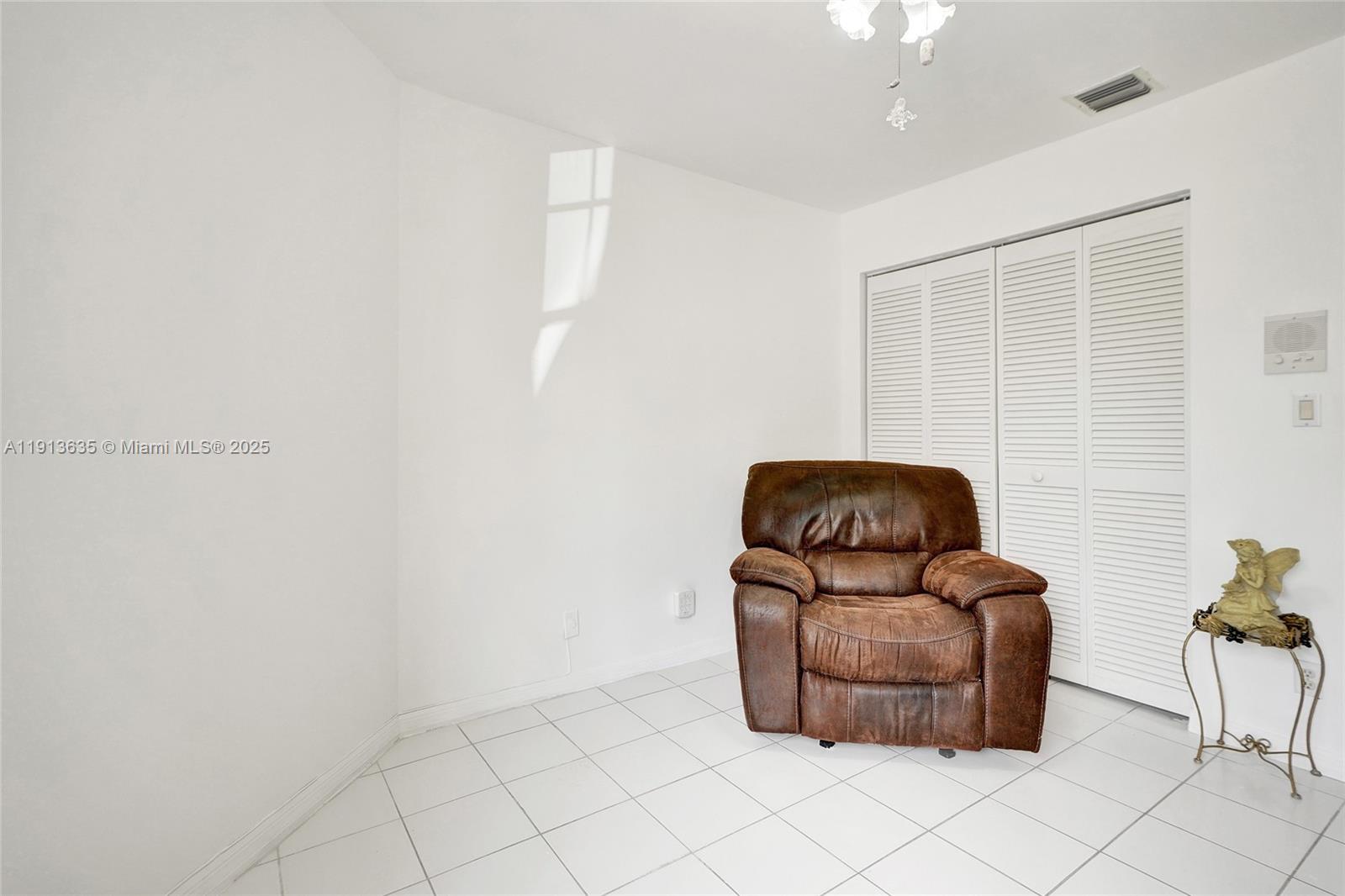 8007 Southwest 157th Place Miami, FL 33193 - Photo 24 of 51 a living room with furniture