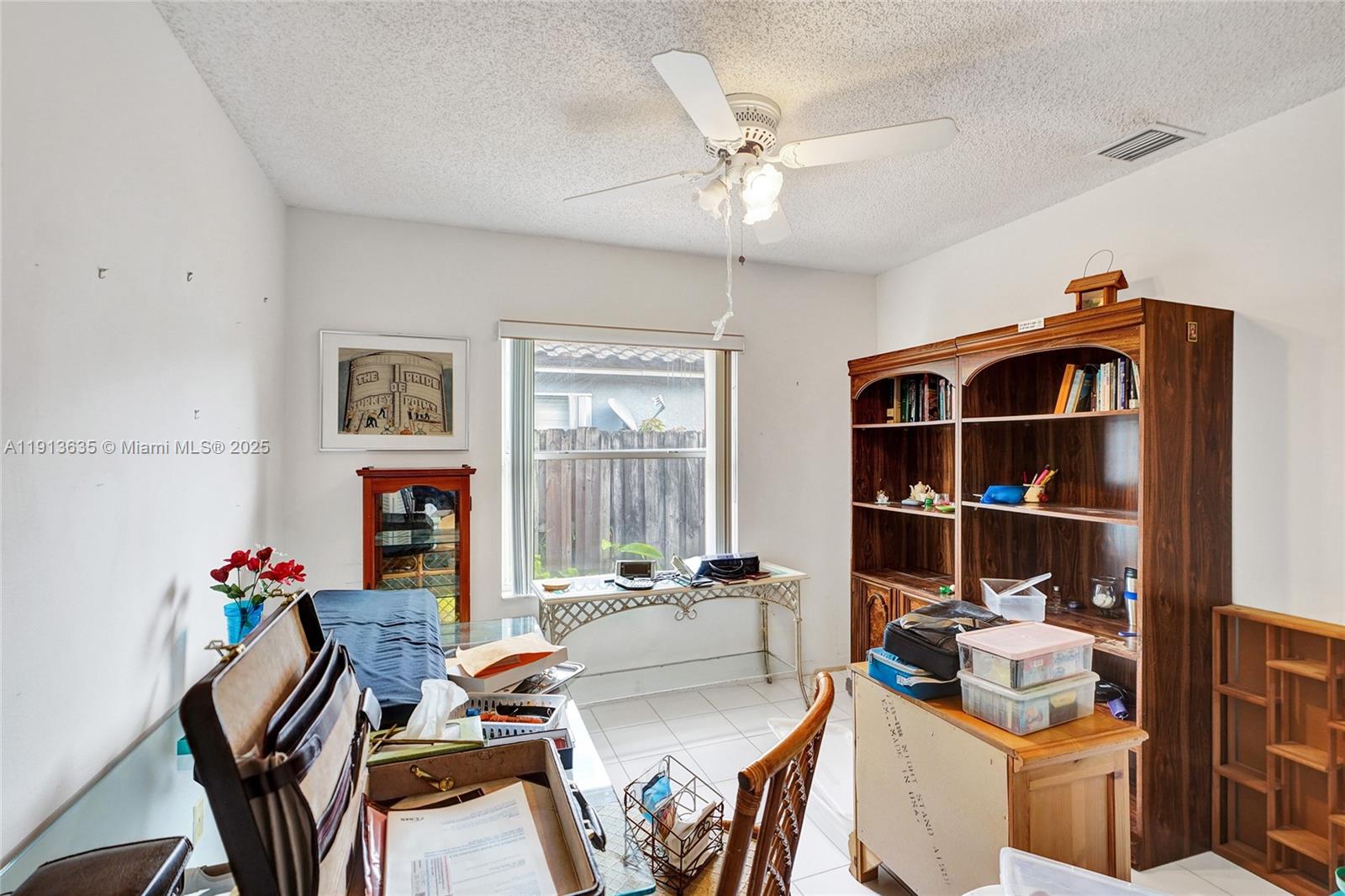 8007 Southwest 157th Place Miami, FL 33193 - Photo 25 of 51 a workspace with furniture and window