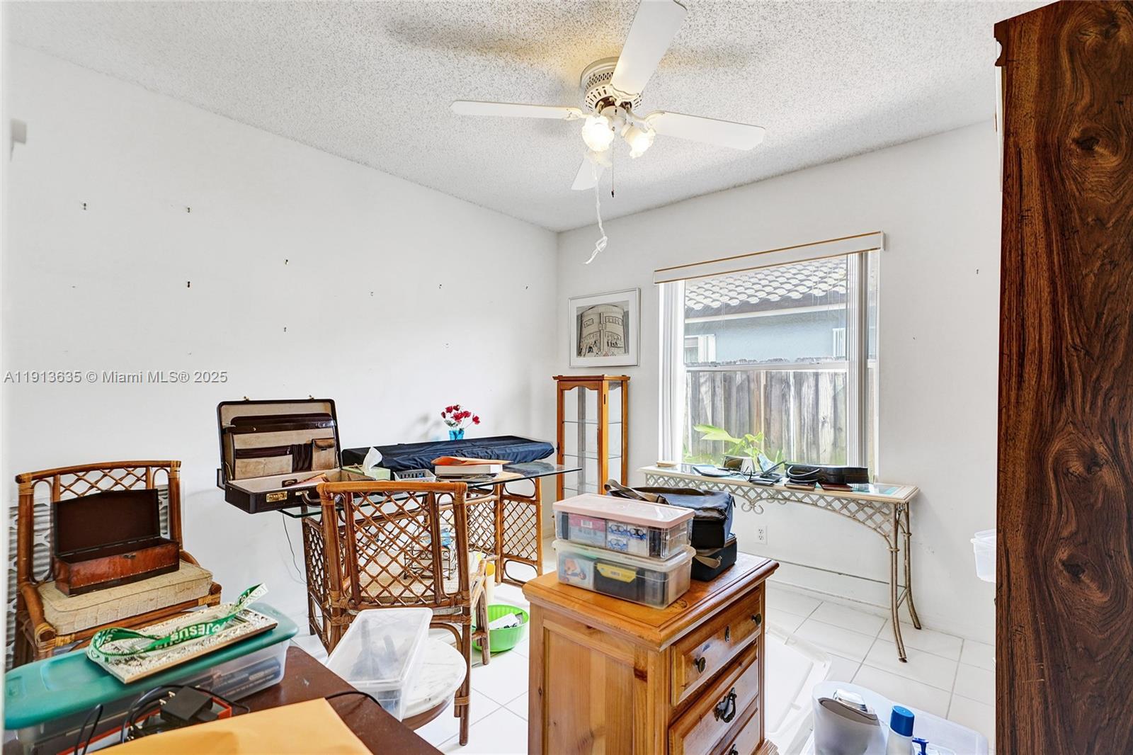 8007 Southwest 157th Place Miami, FL 33193 - Photo 27 of 51 a view of a workspace with furniture