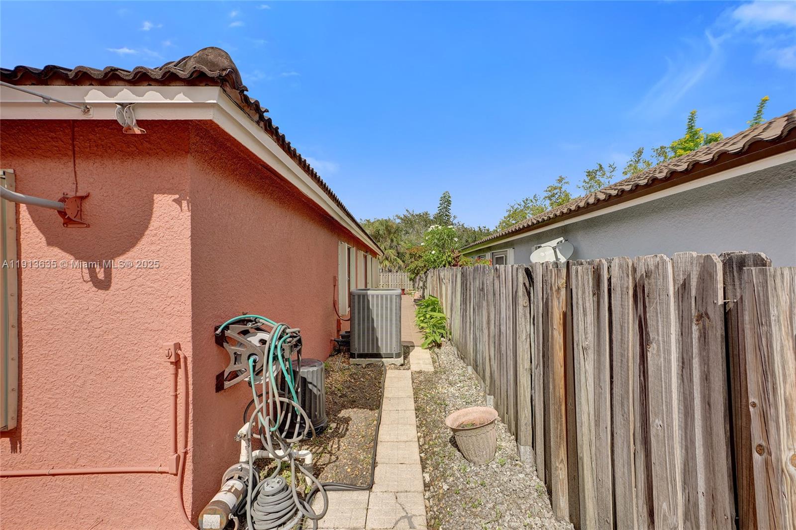 8007 Southwest 157th Place Miami, FL 33193 - Photo 33 of 51 a backyard of a house