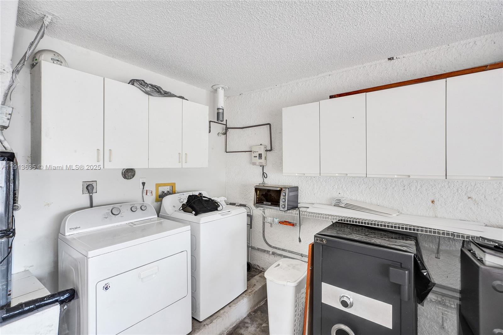 8007 Southwest 157th Place Miami, FL 33193 - Photo 42 of 51 a view of a kitchen with appliances and cabinets