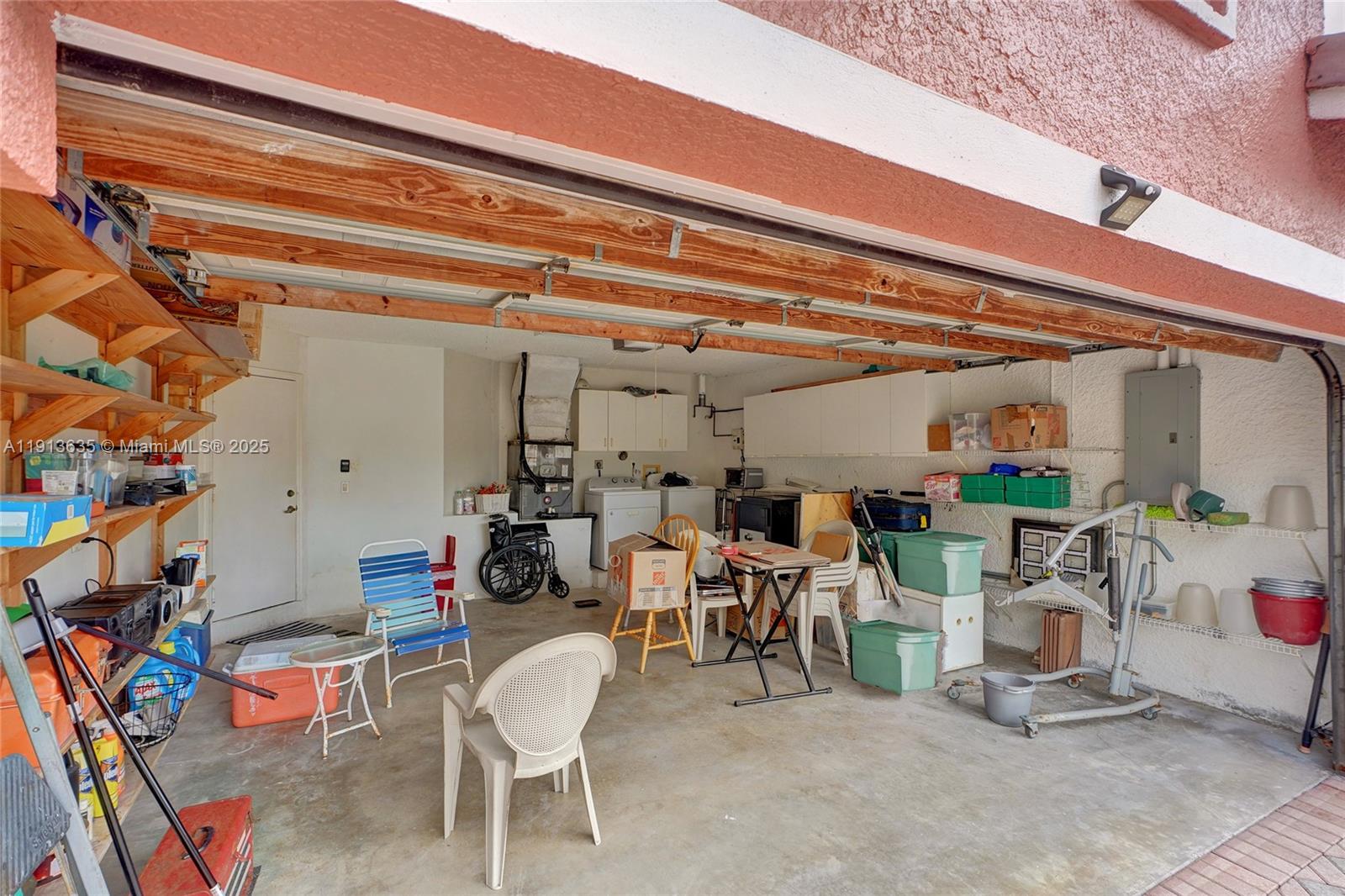 8007 Southwest 157th Place Miami, FL 33193 - Photo 49 of 51 a view of a room with gym equipment