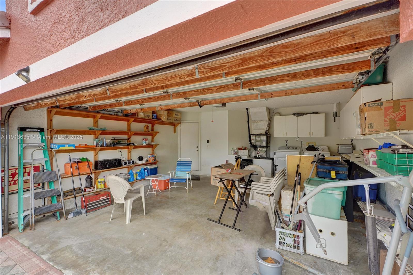 8007 Southwest 157th Place Miami, FL 33193 - Photo 50 of 51 a view of a chairs in a patio