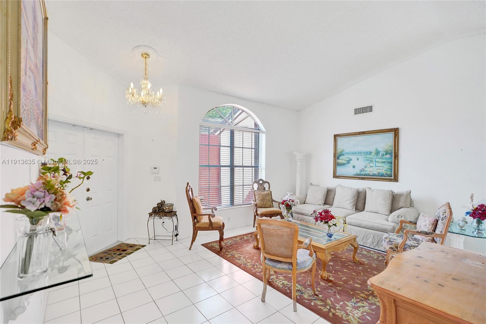 8007 Southwest 157th Place Miami, FL 33193 - Photo 9 of 51 a living room with furniture