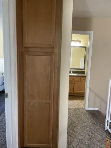 a view of a closet in a room