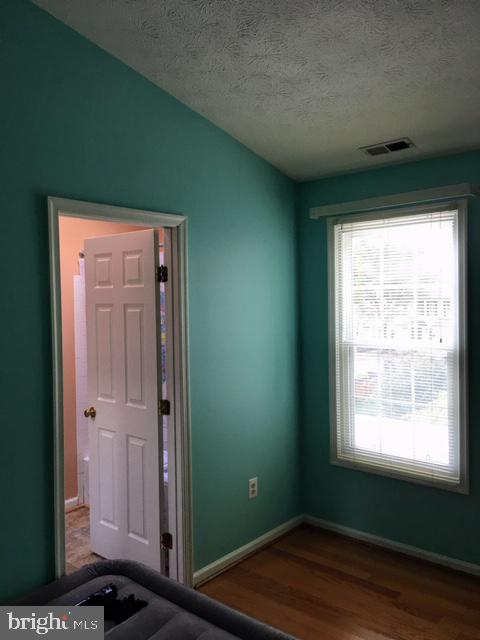 4100 Trentham Drive Baltimore, MD 21208 - Photo 12 of 38 Owner's bedroom-cathedral ceiling
