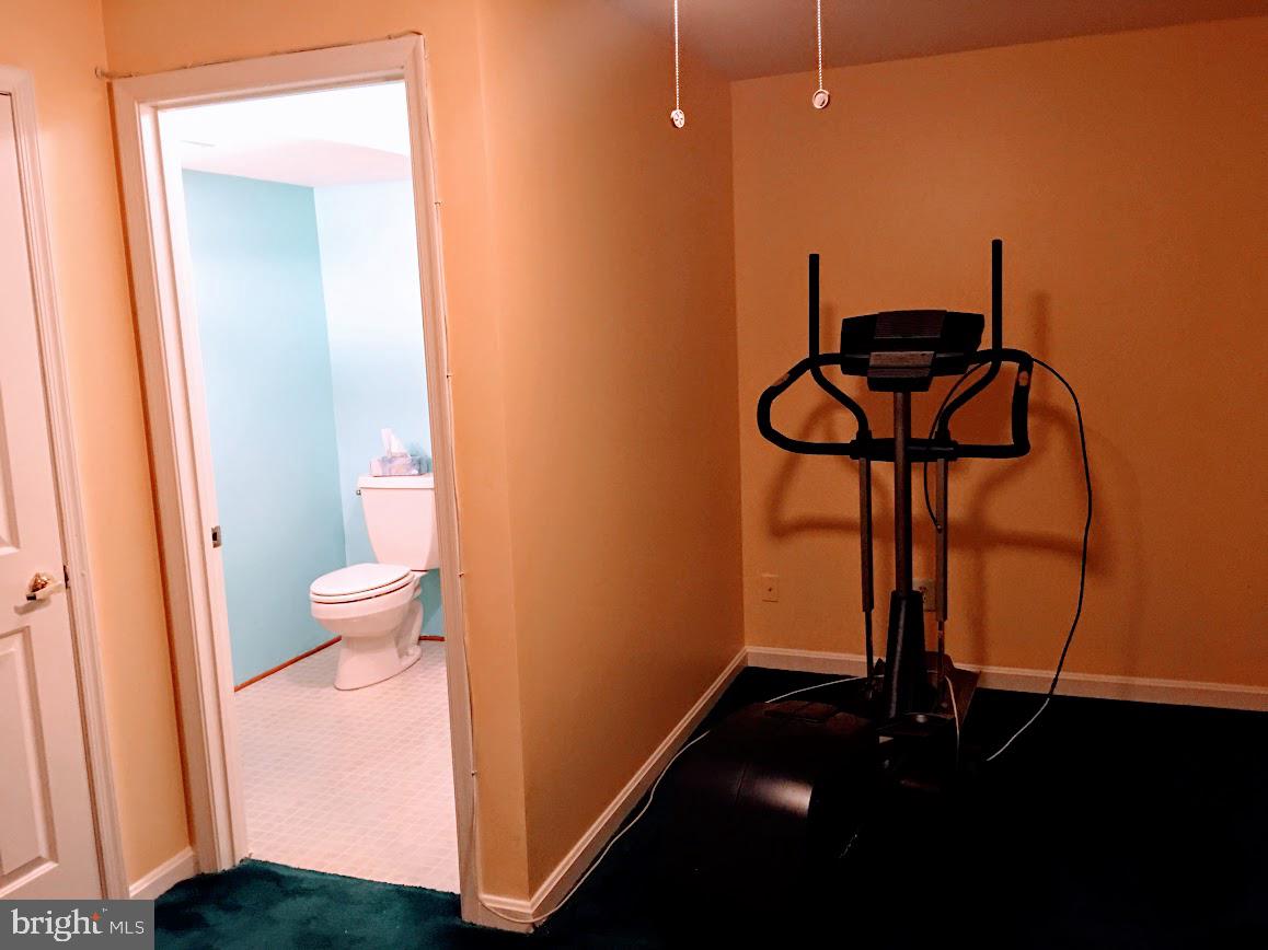 4100 Trentham Drive Baltimore, MD 21208 - Photo 30 of 38 family room with bath