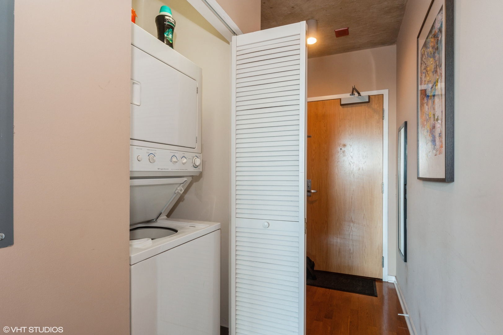 611 South Wells Street, Unit 2602 Chicago, IL 60607 - Photo 11 of 15 a bathroom with a toilet and a shower