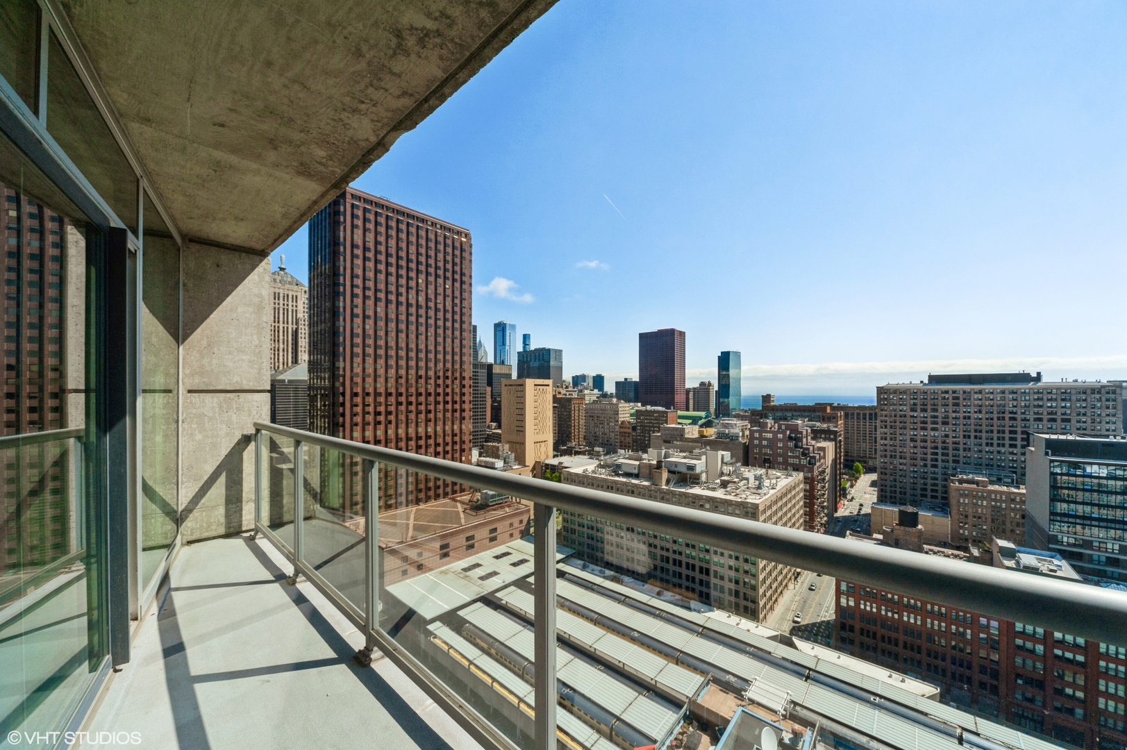 611 South Wells Street, Unit 2602 Chicago, IL 60607 - Photo 4 of 15 a view of a balcony with wooden floor