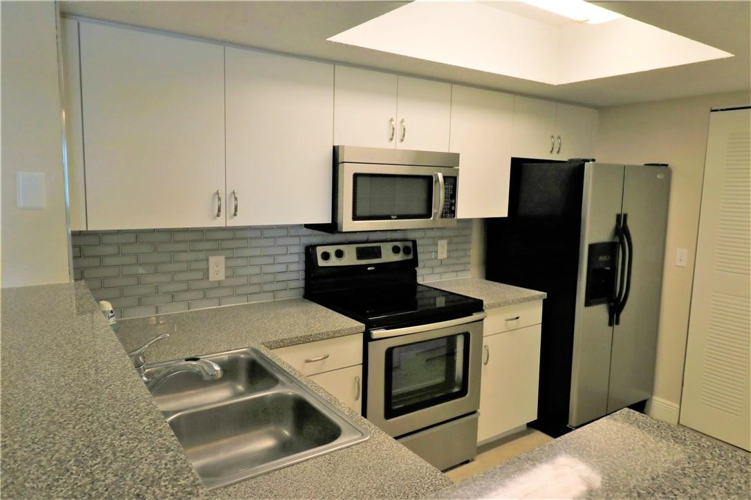 5061 Wiles Road Pompano Beach, FL 33073 - Photo 3 of 11 Photo 3