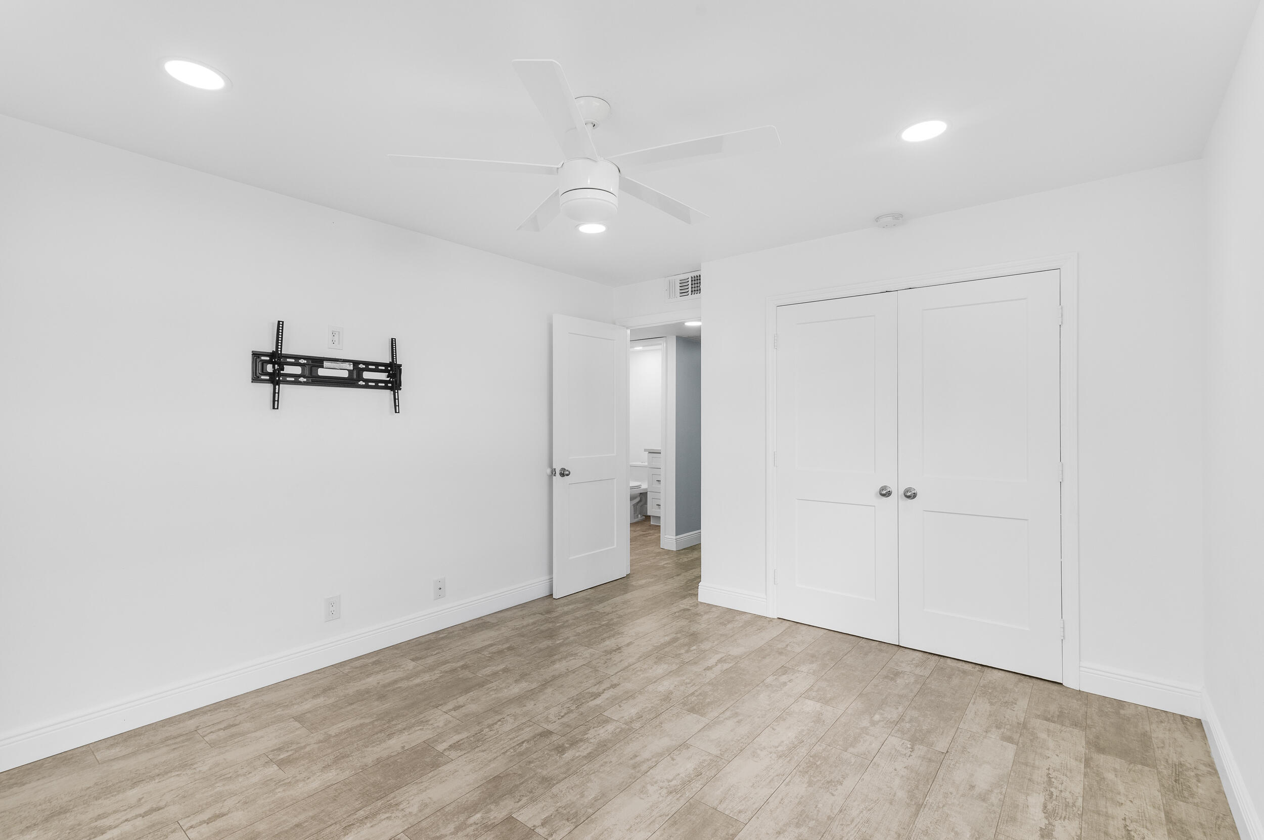 244 Monaco Way Delray Beach, FL 33446 - Photo 18 of 63 an empty room with a bathroom and a shower