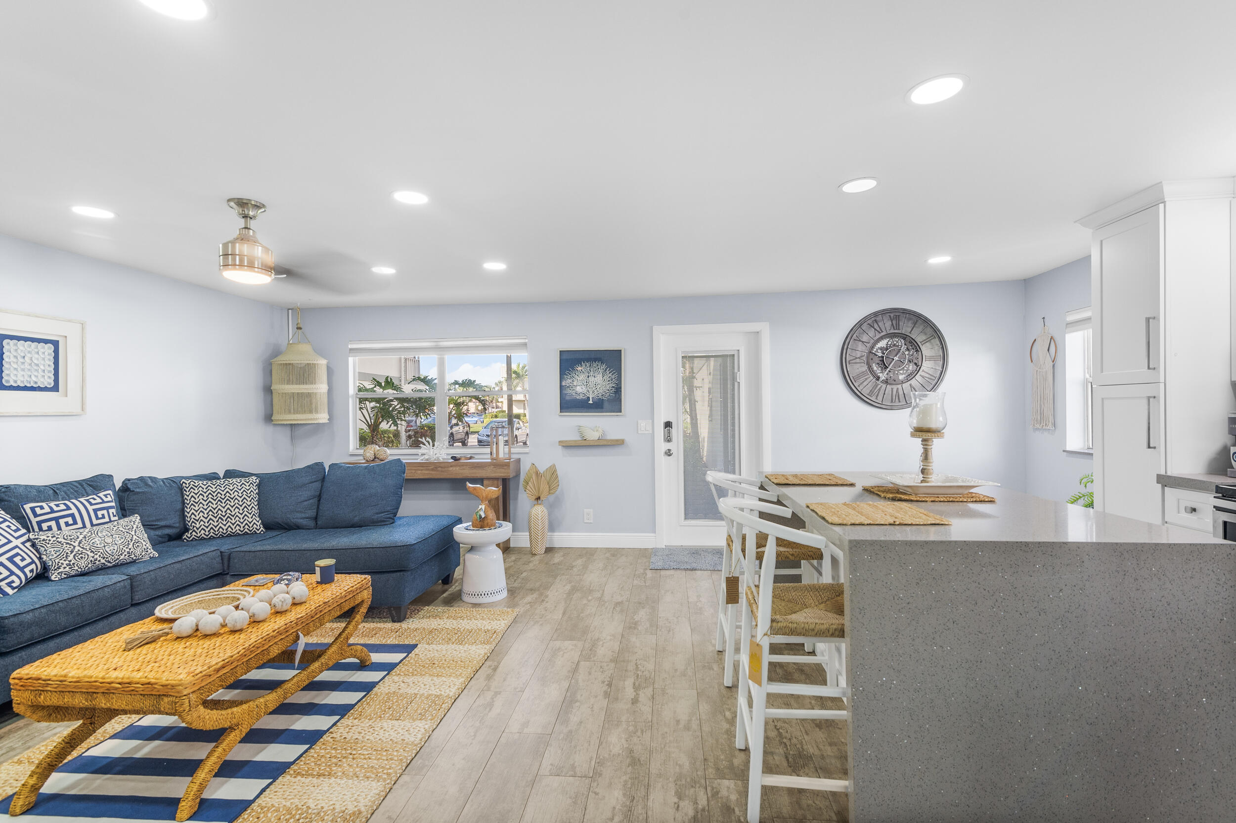 244 Monaco Way Delray Beach, FL 33446 - Photo 22 of 63 a living room with furniture and a wooden floor
