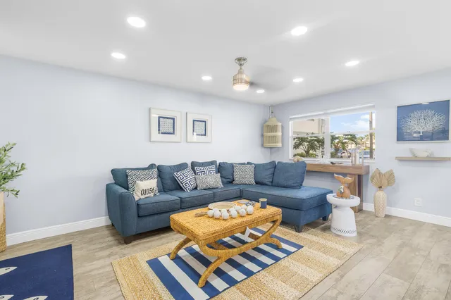 a view of a chairs and table in a patio