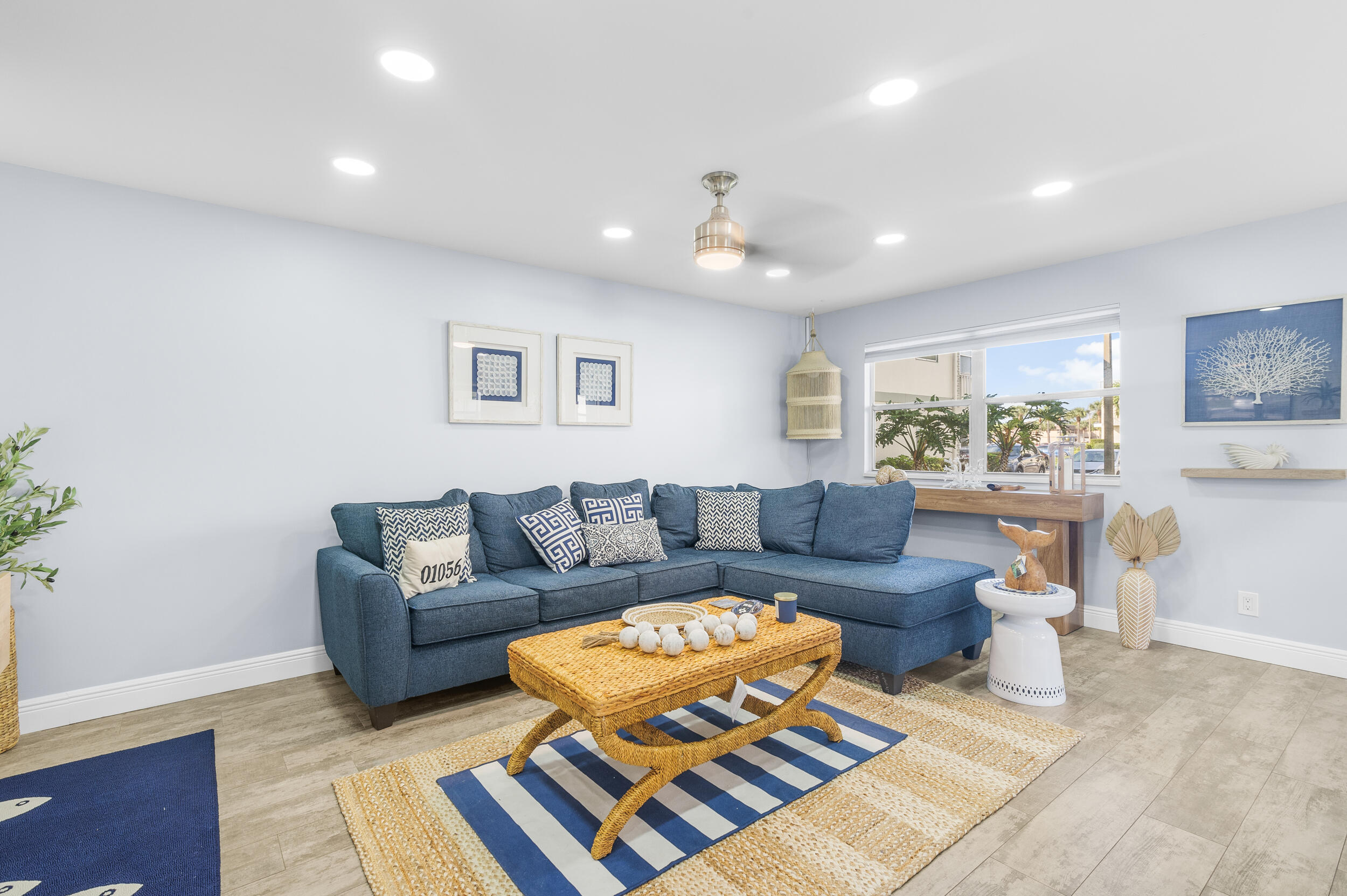 244 Monaco Way Delray Beach, FL 33446 - Photo 23 of 63 a living room with furniture and a large window