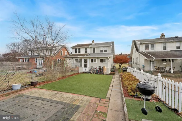 a view of a building with a yard