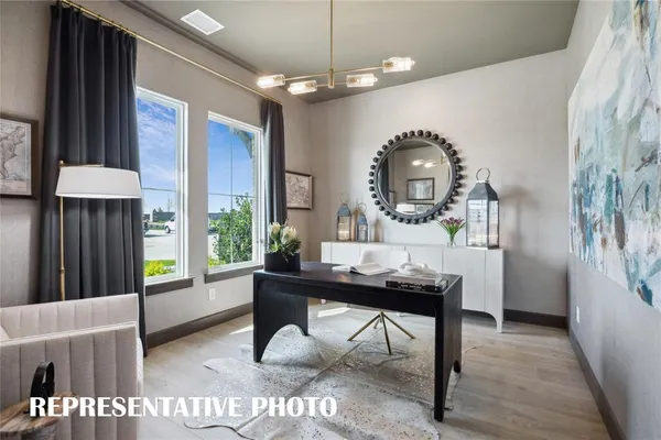 a kitchen with stainless steel appliances kitchen island granite countertop a refrigerator and a stove top oven
