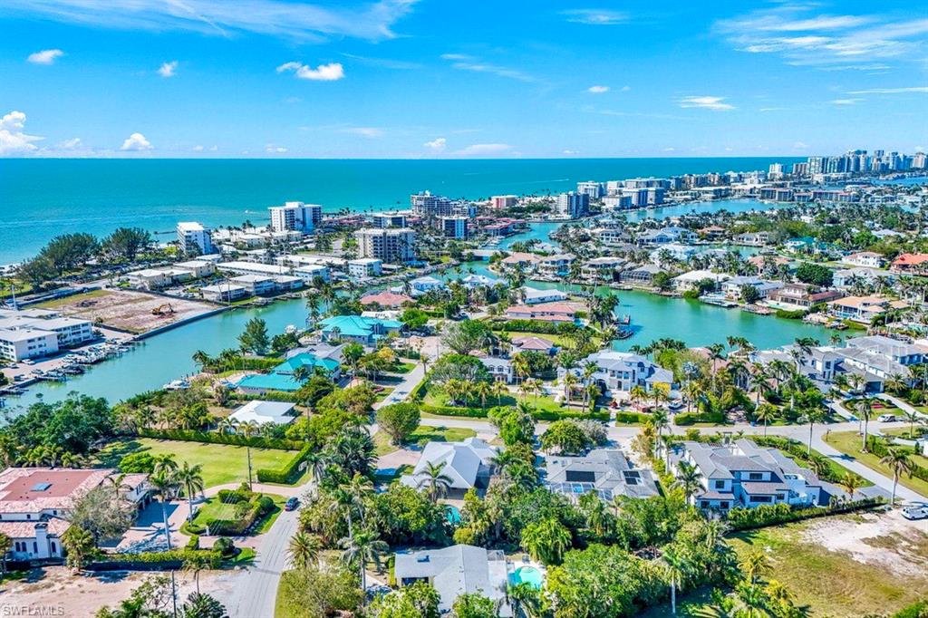 289 Springline Drive Naples, FL 34102 - Photo 5 of 9 a view of a city