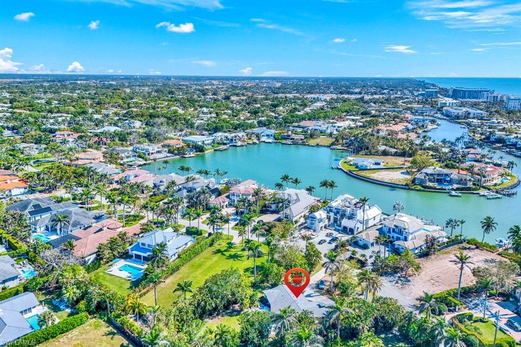 289 Springline Drive Naples, FL 34102 - Photo 6 of 9 a view of a city and lake view