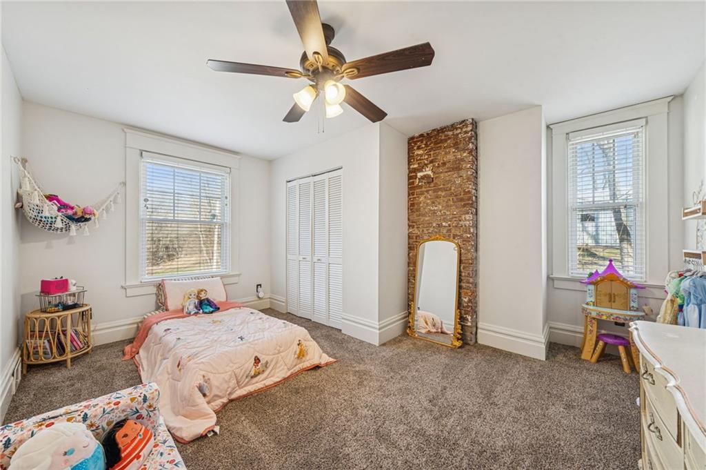 416 Pine Run Road Fombell, PA 16123 - Photo 35 of 50 a bed room with a bed and a window