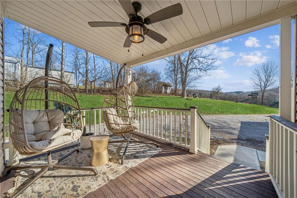 416 Pine Run Road Fombell, PA 16123 - Photo 40 of 50 a view of a patio with a table chairs and backyard