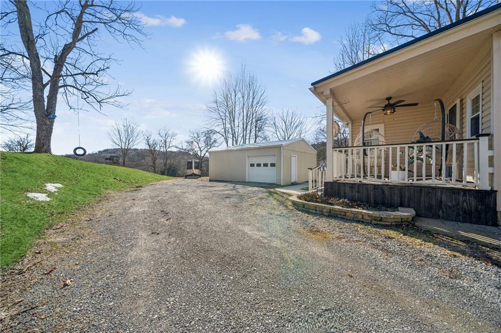 416 Pine Run Road Fombell, PA 16123 - Photo 41 of 50 a view of a house with a yard