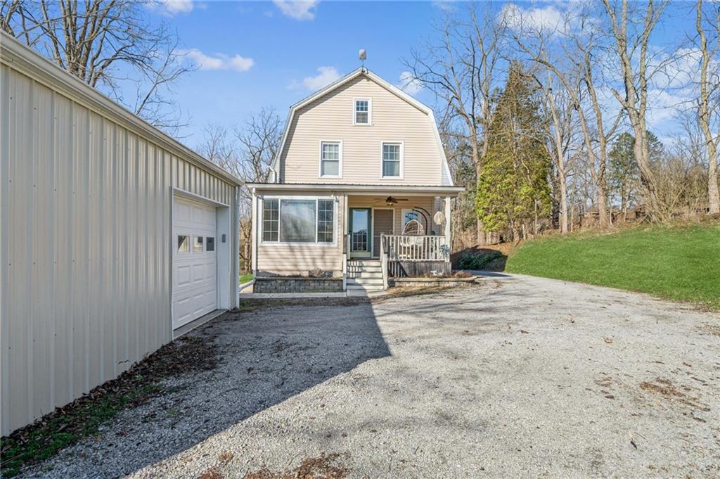 416 Pine Run Road Fombell, PA 16123 - Photo 42 of 50 a view of a house with a yard
