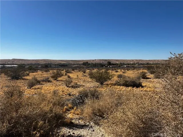 an aerial view of residential building and ocean