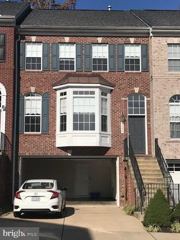 a car parked in front of a building