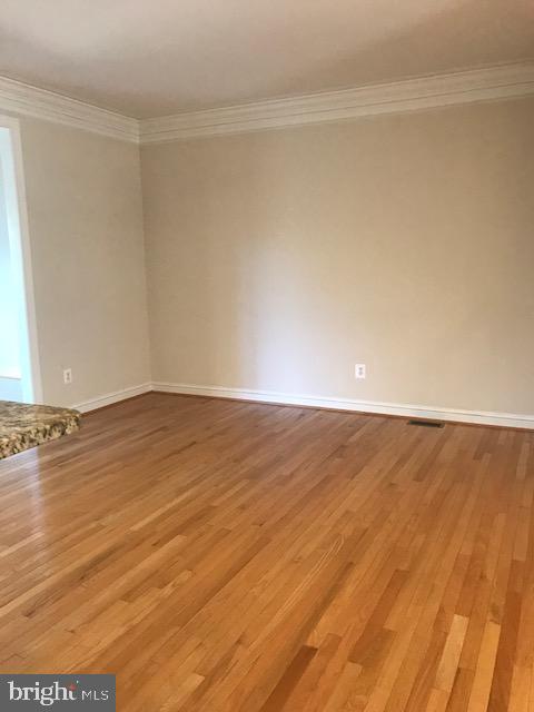 3680 Chippendale Circle Woodbridge, VA 22193 - Photo 26 of 49 a view of an empty room with wooden floor