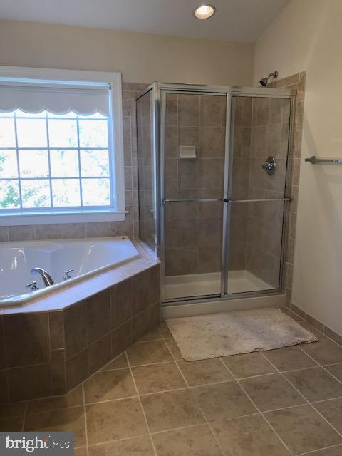 3680 Chippendale Circle Woodbridge, VA 22193 - Photo 48 of 49 a bathroom with a shower and a bathtub