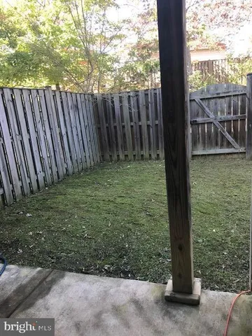 a view of a wooden fence