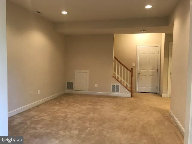 3680 Chippendale Circle Woodbridge, VA 22193 - Photo 10 of 49 a view of an empty room with wooden floor and windows