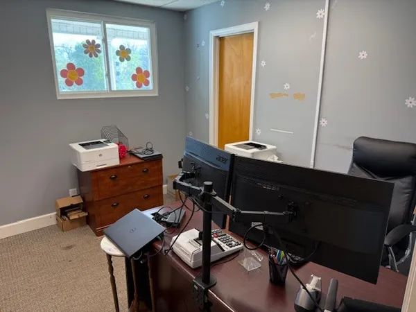 a room with furniture and wooden floor