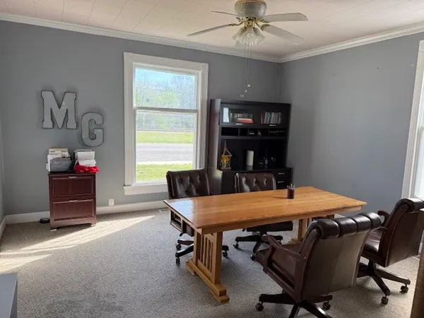 a view of a dining room with furniture