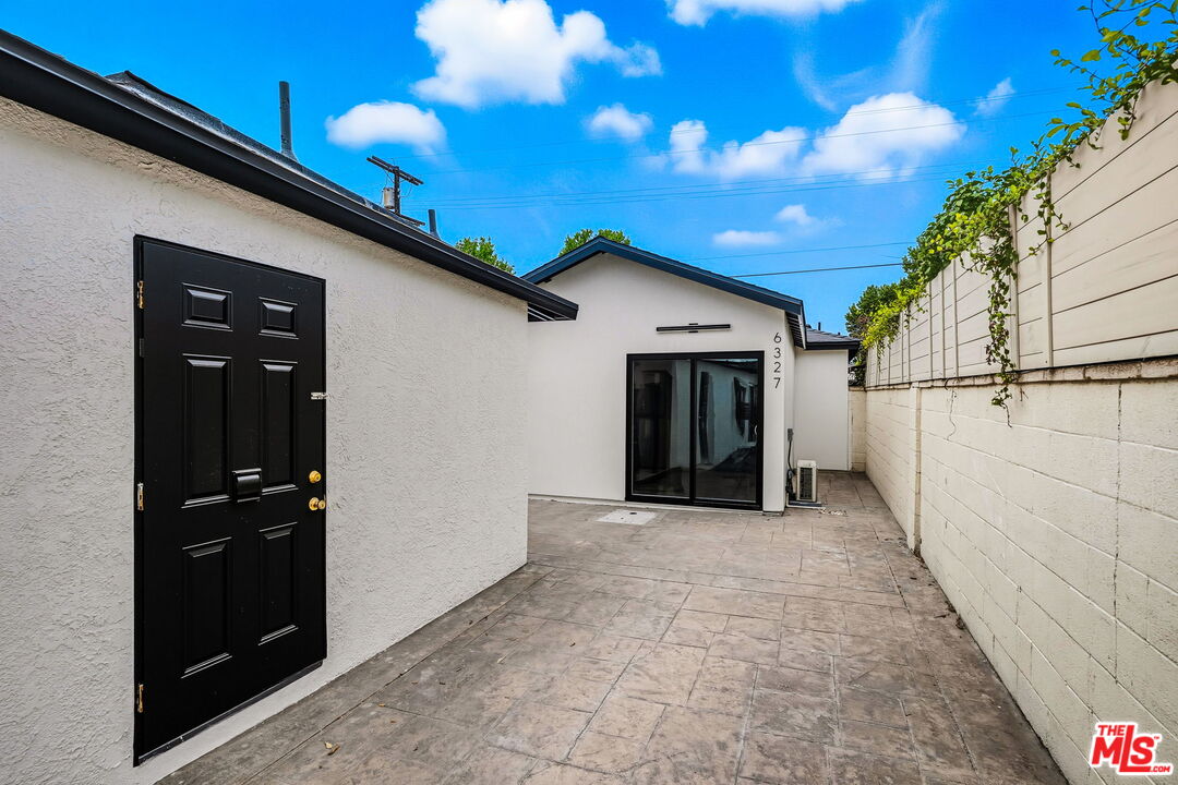 6327 Babcock Avenue Valley Glen, CA 91606 - Photo 3 of 21 a view of a house with a yard