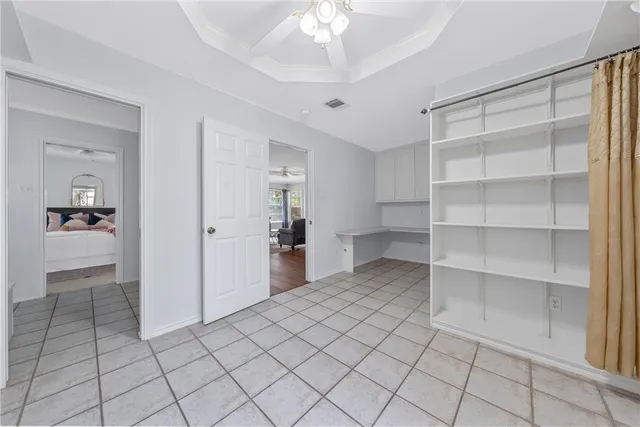 a view of an empty room and shelves