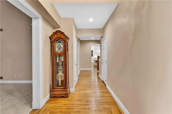 a hallway with wooden floor
