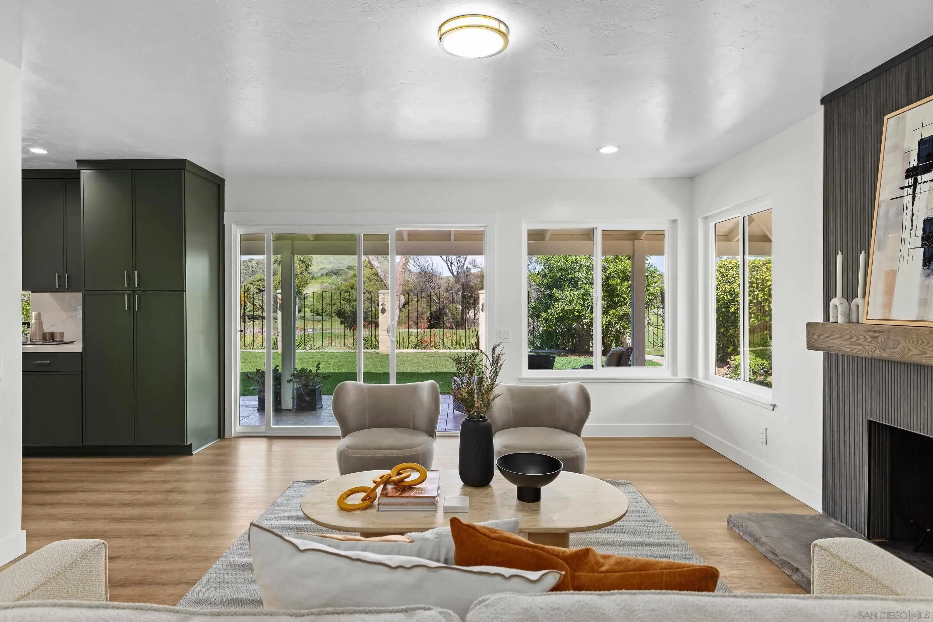 4422 Point Degada Oceanside, CA 92058 - Photo 17 of 57 a living room with furniture and a large window