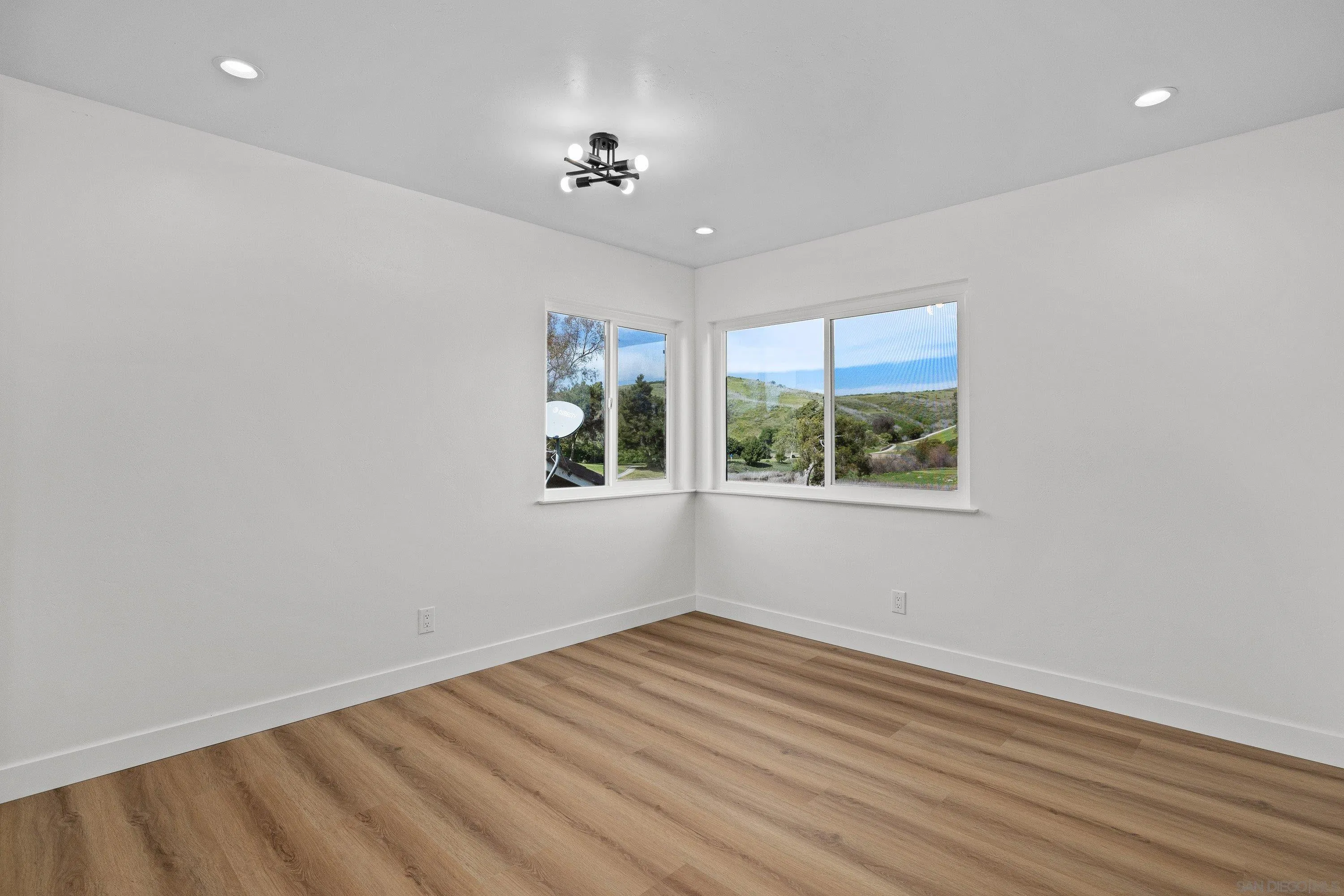 4422 Point Degada Oceanside, CA 92058 - Photo 35 of 57 wooden floor in an empty room with a window