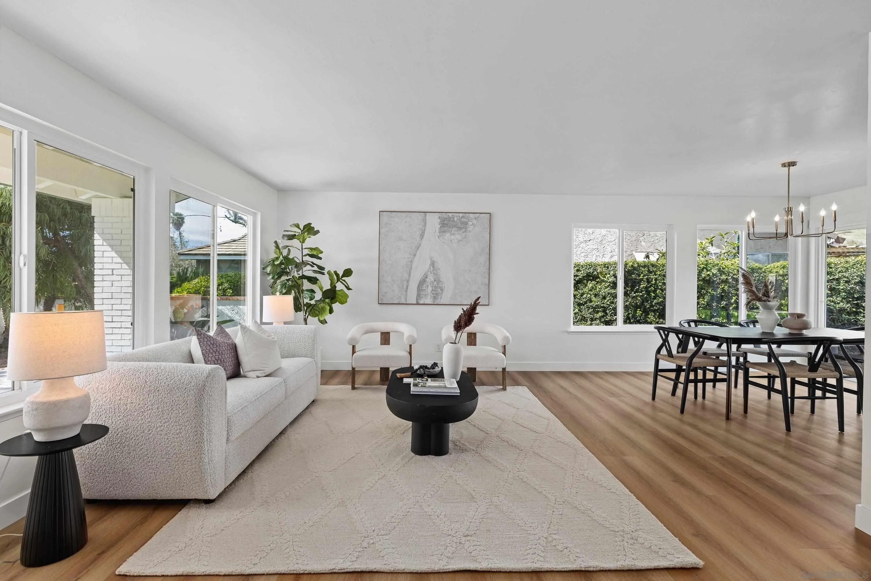 4422 Point Degada Oceanside, CA 92058 - Photo 4 of 57 a living room with furniture and a large window