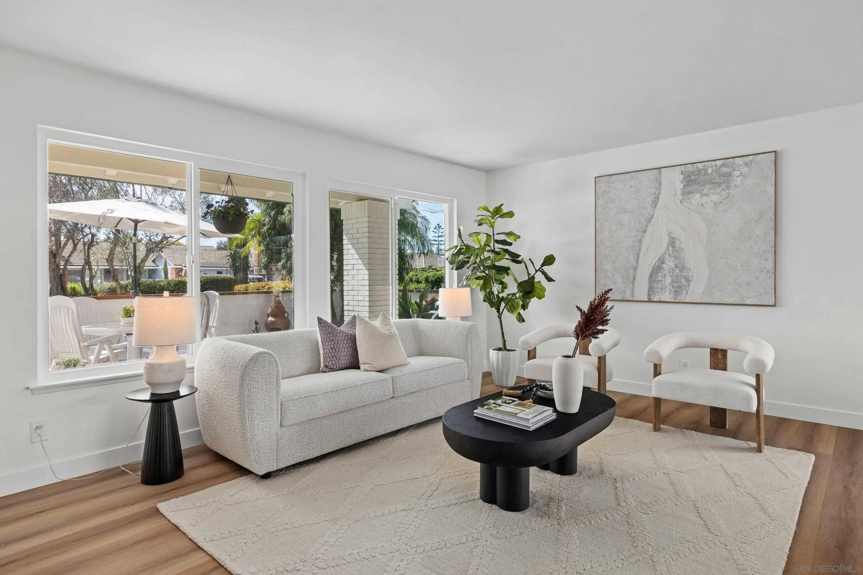 4422 Point Degada Oceanside, CA 92058 - Photo 5 of 57 a living room with furniture and a large window