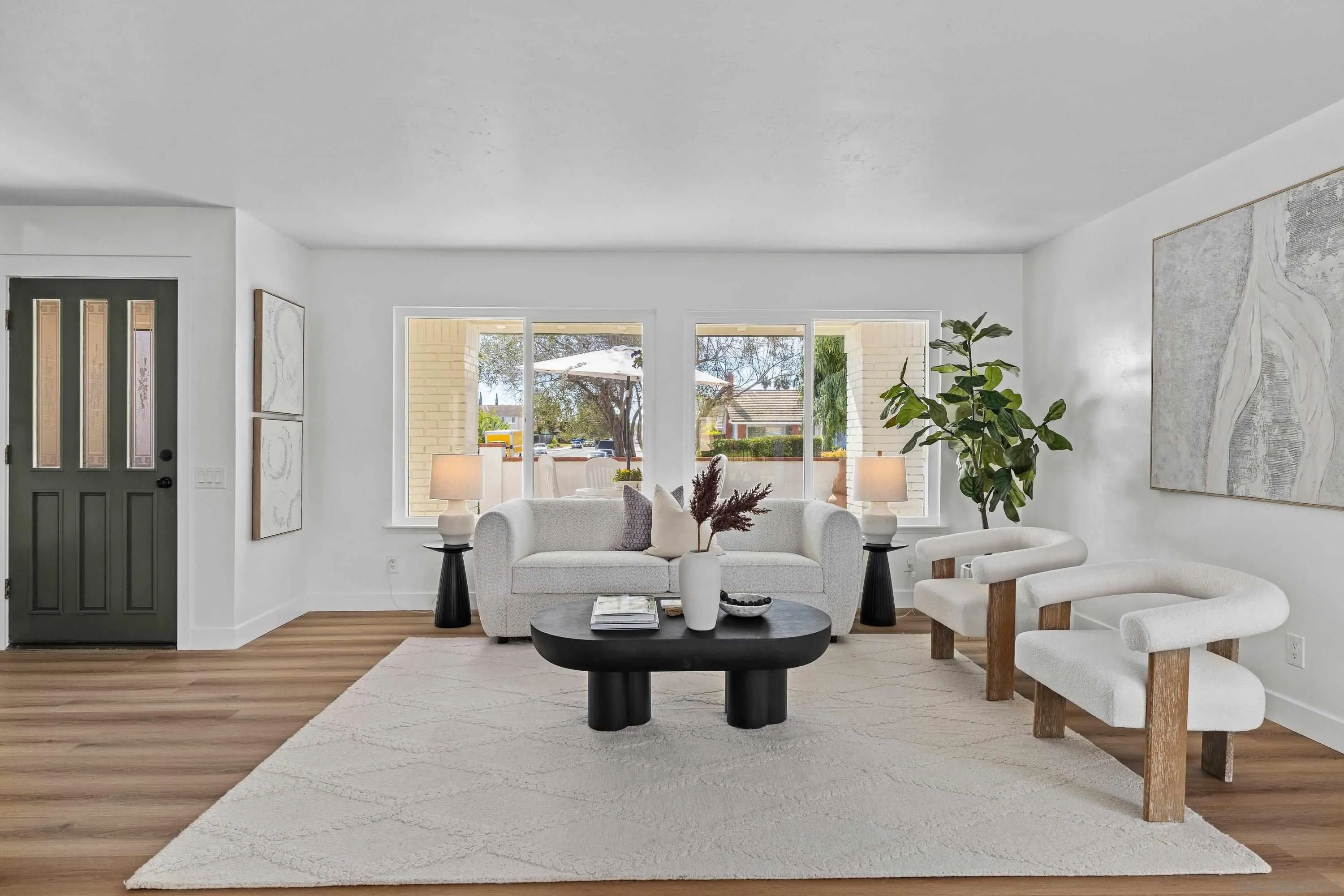 4422 Point Degada Oceanside, CA 92058 - Photo 6 of 57 a living room with furniture and a large window