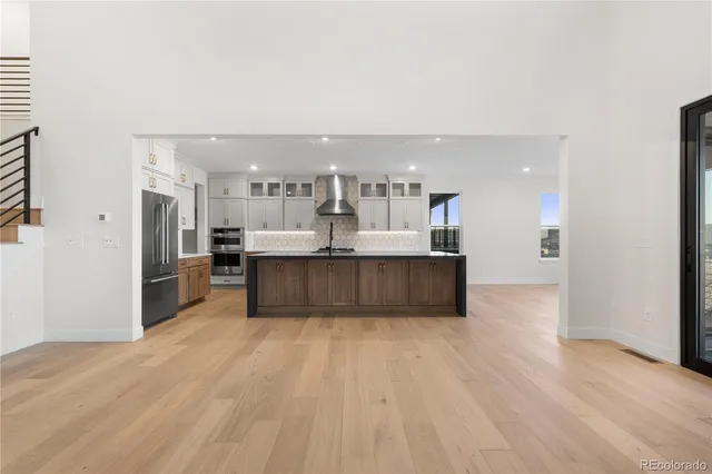 a view of kitchen with wooden floor