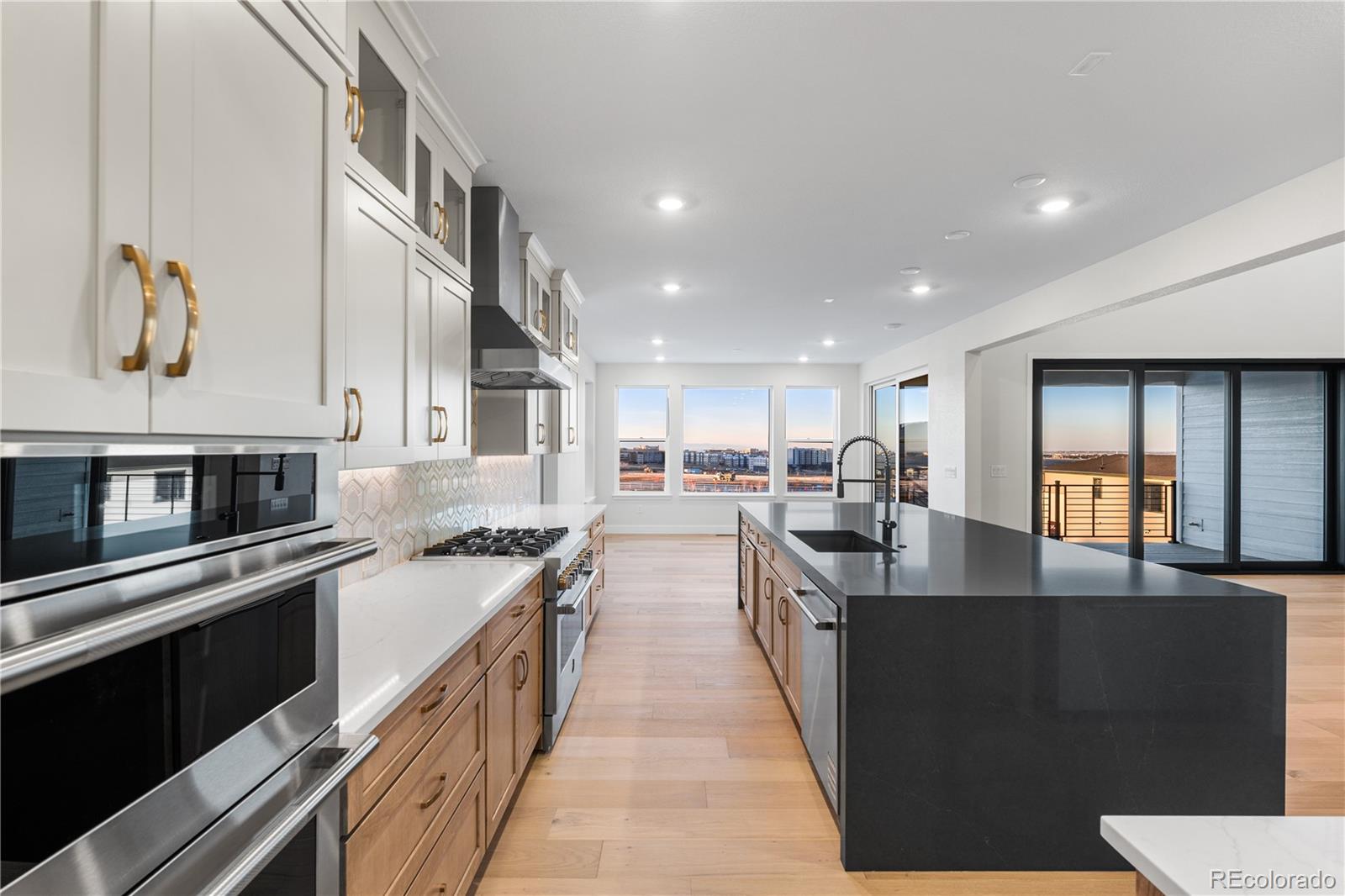 11283 Tenor Trail Lone Tree, CO 80134 - Photo 17 of 47 a kitchen with lots of counter top space