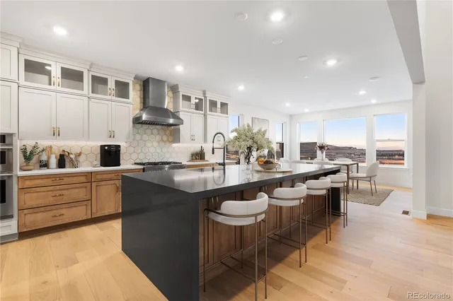 a kitchen with counter space cabinets a sink and appliances