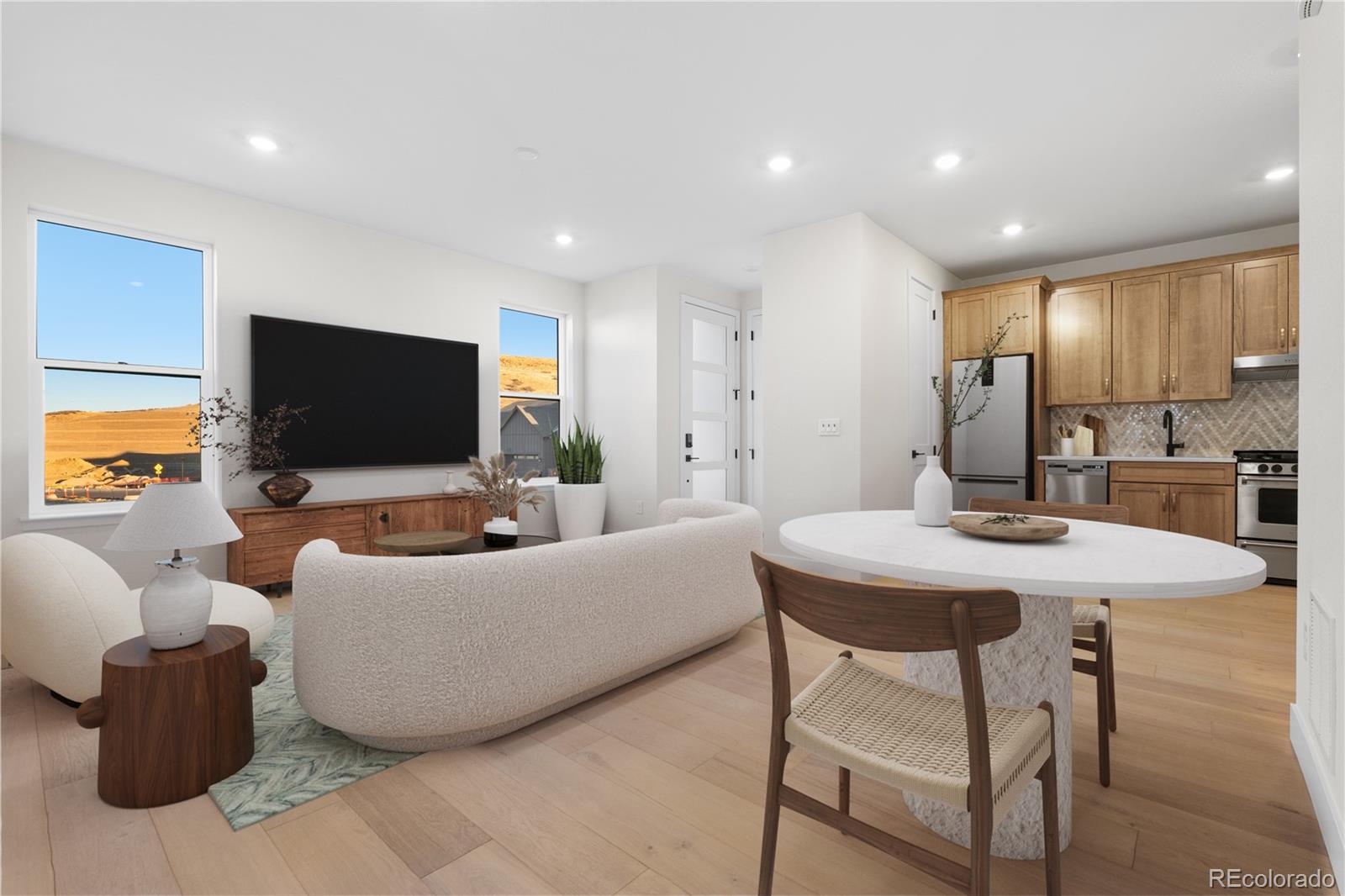 11283 Tenor Trail Lone Tree, CO 80134 - Photo 20 of 47 a living room with furniture and a flat screen tv