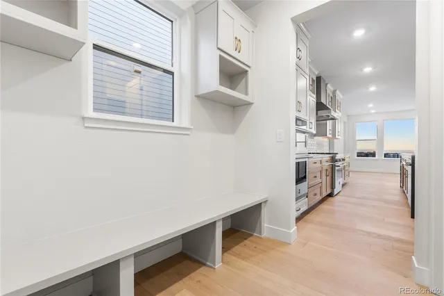 a view of a living room with a wooden floor
