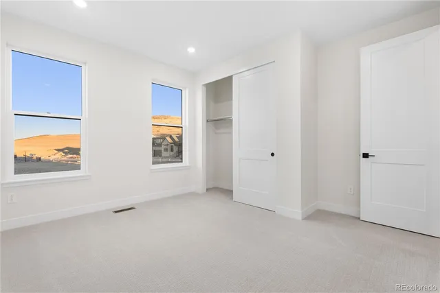 an empty room with windows