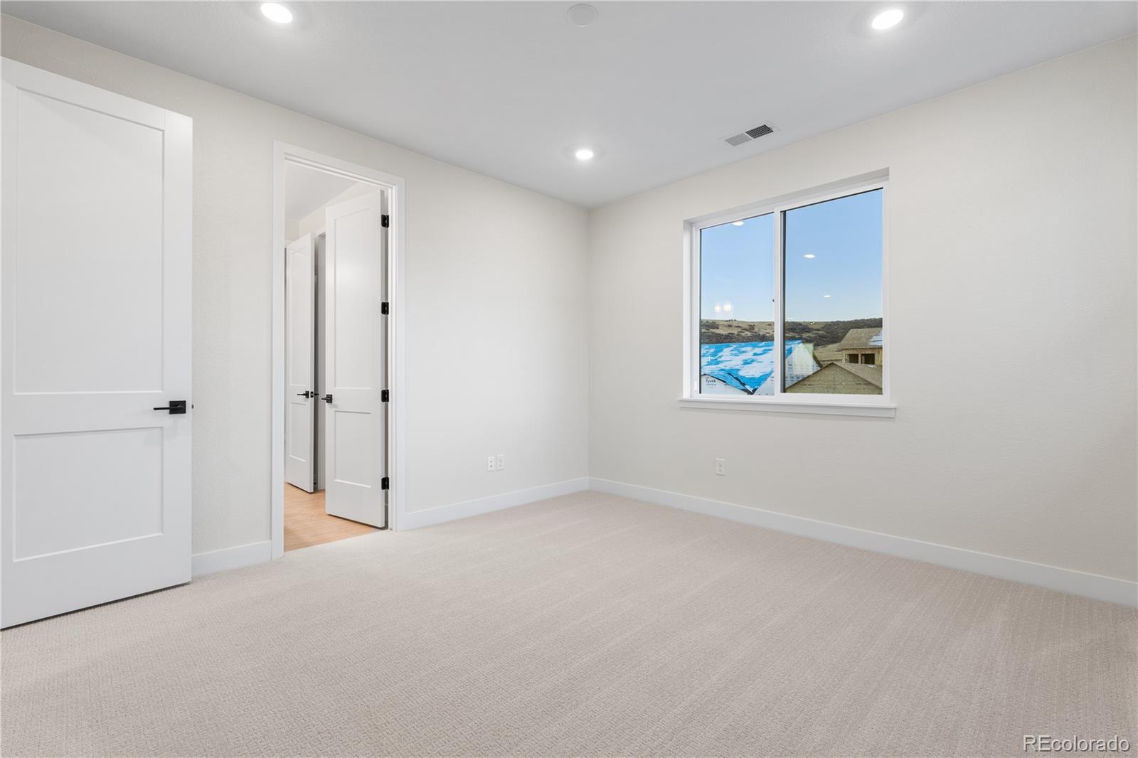 11283 Tenor Trail Lone Tree, CO 80134 - Photo 35 of 47 a view of an empty room
